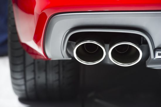 Red Car Exhaust Pipe — Huntsville, AL — Worth Exhaust Center Red Car Exhaust Pipe — Huntsville, AL — Worth Exhaust Center