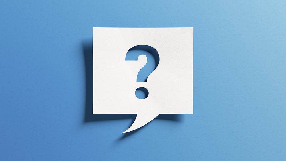 White speech bubble with question mark on blue background.