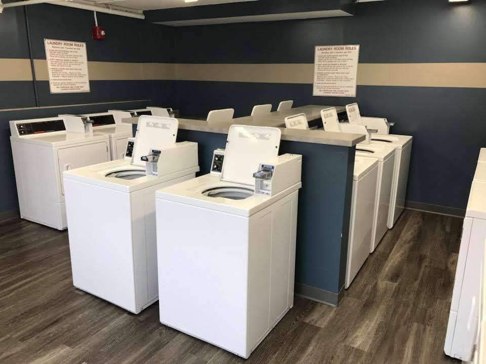 Laundry facility with approximately 10 washers shown.