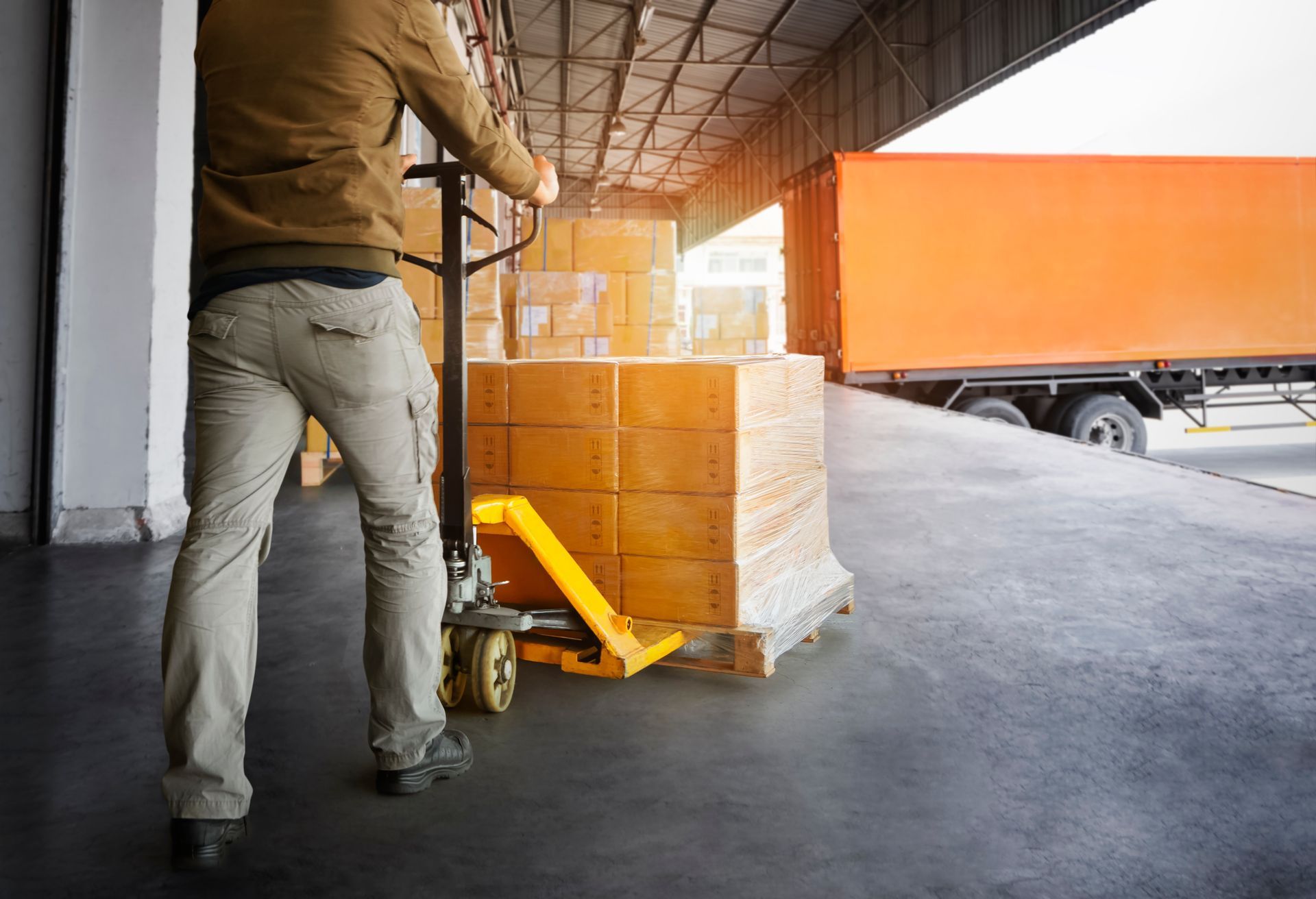 Cargo loading to the orange truck
