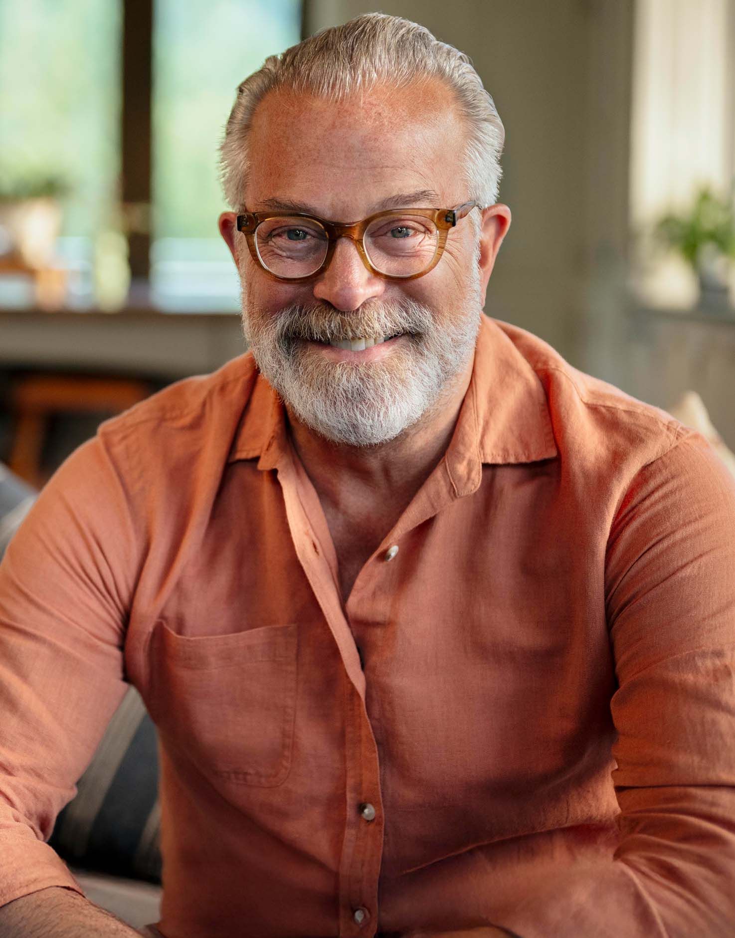 Bill P., photographer, Starkey Omega AI wearer story