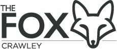 A black and white logo for the fox crawley with a fox head.