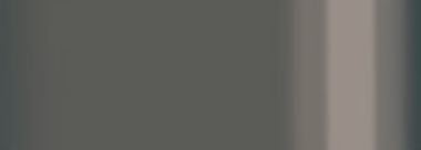 Blurry gray and beige vertical stripes filling the frame