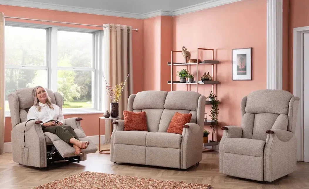 Gray upholstered recliner chair in a light gray room