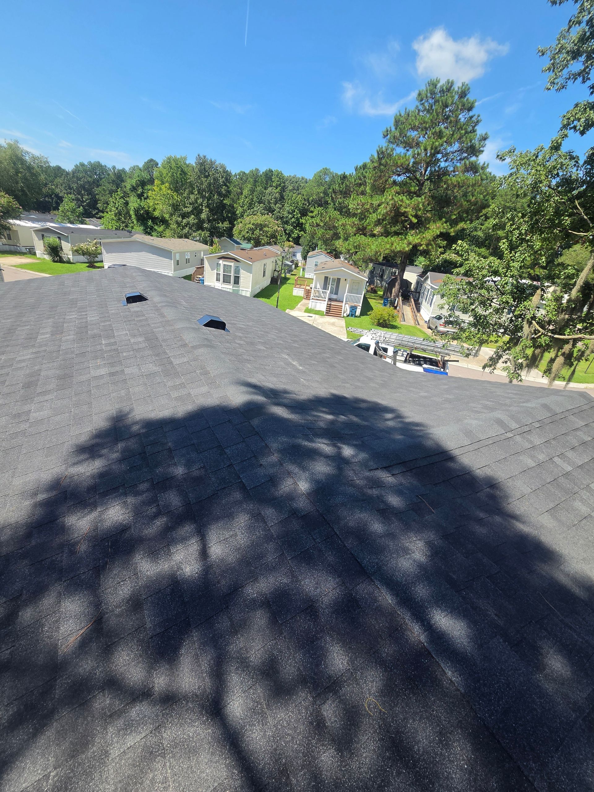 A grid of finished Charleston Roofs and Windows projects in Charleston SC: an Atlas architectural shingle roof replacement in West Ashley, a standing seam metal roof on a raised James Island home, a repaired chimney flashing detail on a peninsula single house, new impact windows, James Hardie siding and seamless aluminum gutters. The image shows every roofing service Charleston homeowners can book from one locally owned company with a W2 project manager on each job.