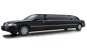 A black limousine is parked on a white background.