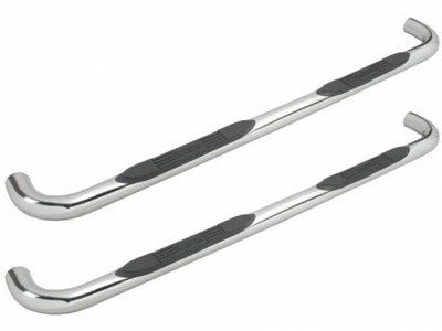 Chrome tubular side steps for a vehicle, featuring black non-slip pads.