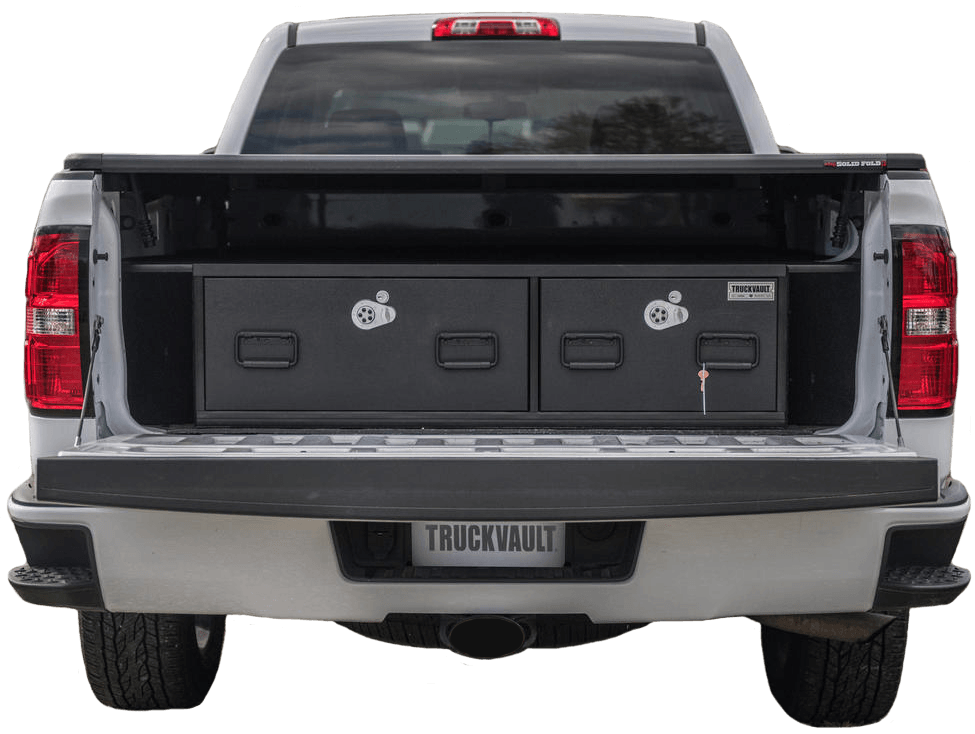 Black TruckVault drawer system in a pickup truck bed, secured with locks.