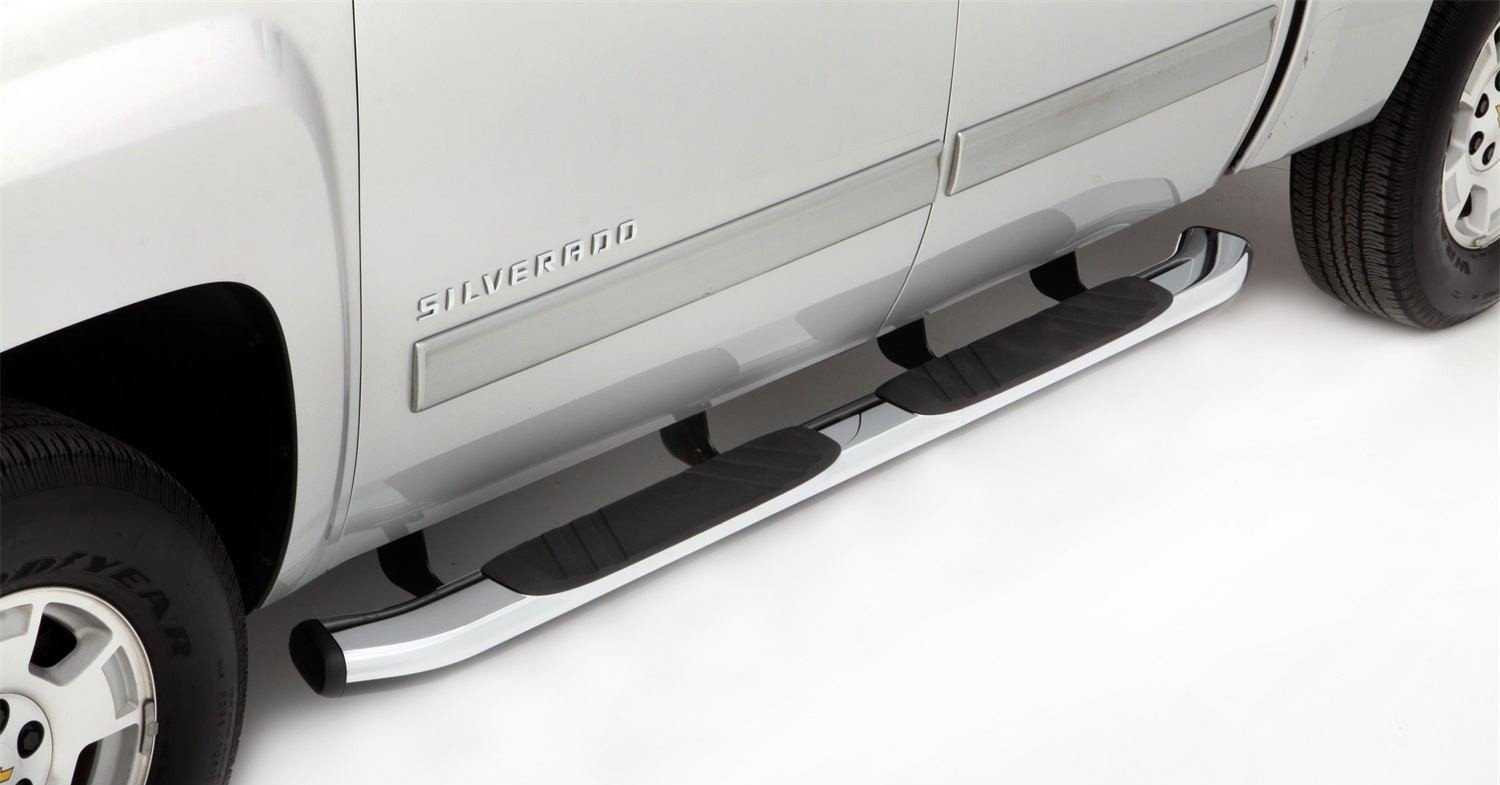 Chrome running boards on a silver pickup truck; black step pads.