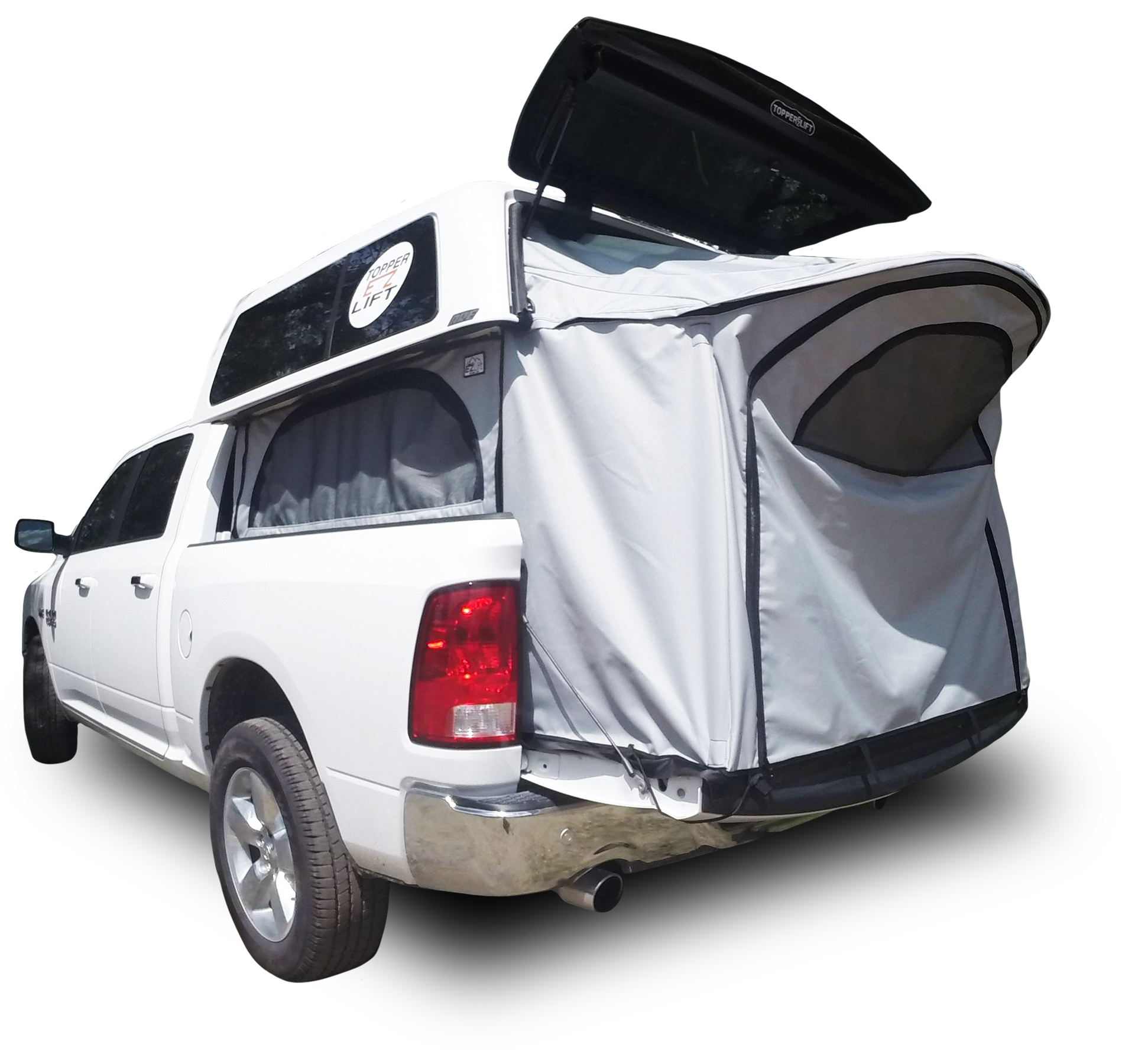 White pickup truck with a Topper EZ Lift camper shell and an attached rear tent extension.