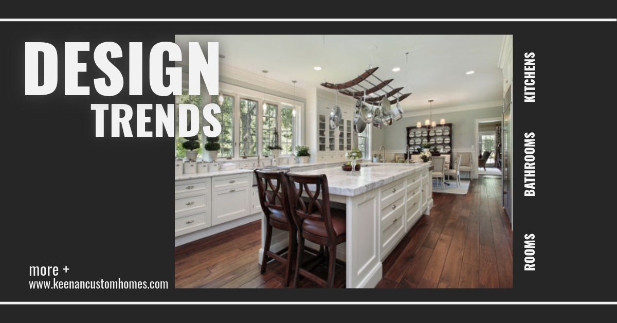 An ad for design trends featuring a bright white kitchen with a large island and dark wooden floors.