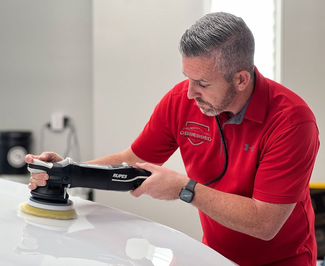 obsessed detail and restoration paint correction service for a white vehicle