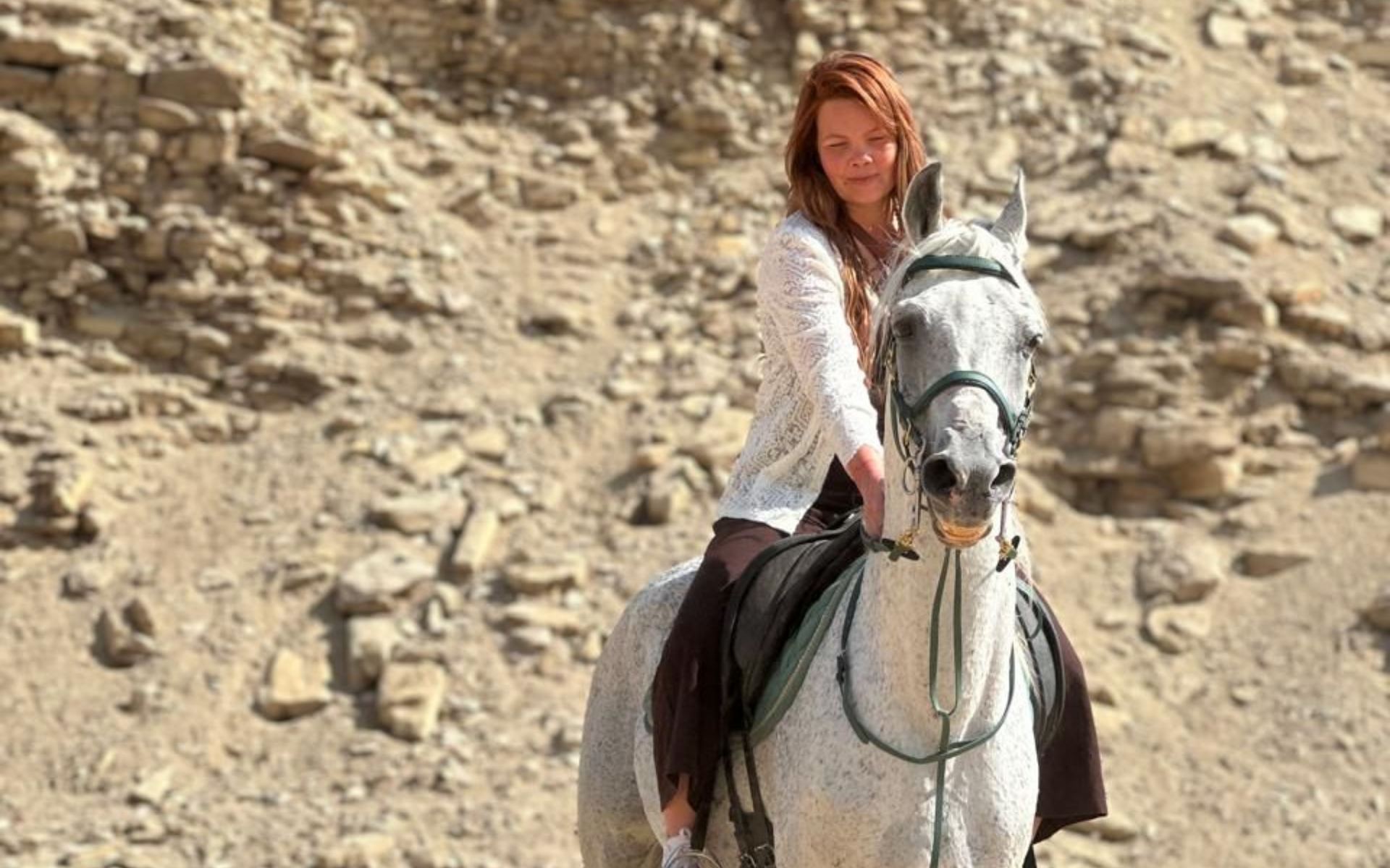 Rider near ancient pyramids in Cairo