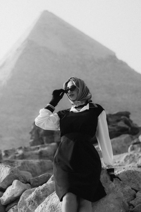 Woman visiting the Great Pyramid of Giza in Egypt