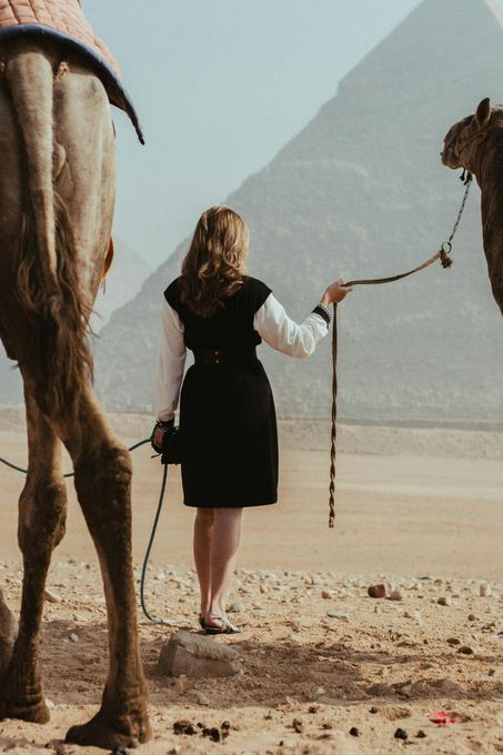 Tourist exploring the desert near the Giza Pyramids