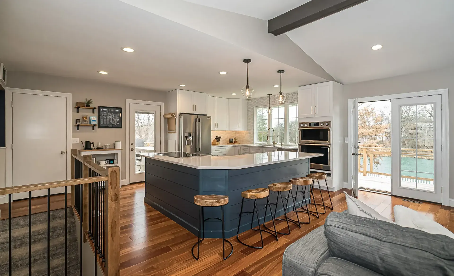A kitchen with a large island in the middle of the room.