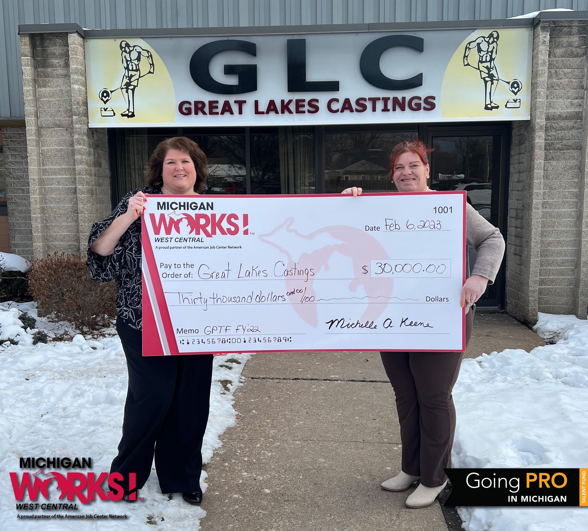 Michigan Works! West Central Executive Director Shelly Keene (left) presents a check for $30,000 to Jennifer Luzar or Great Lakes Castings. The company recently completed its FY22 Going PRO Talent Fund training plan to train 37 individuals.