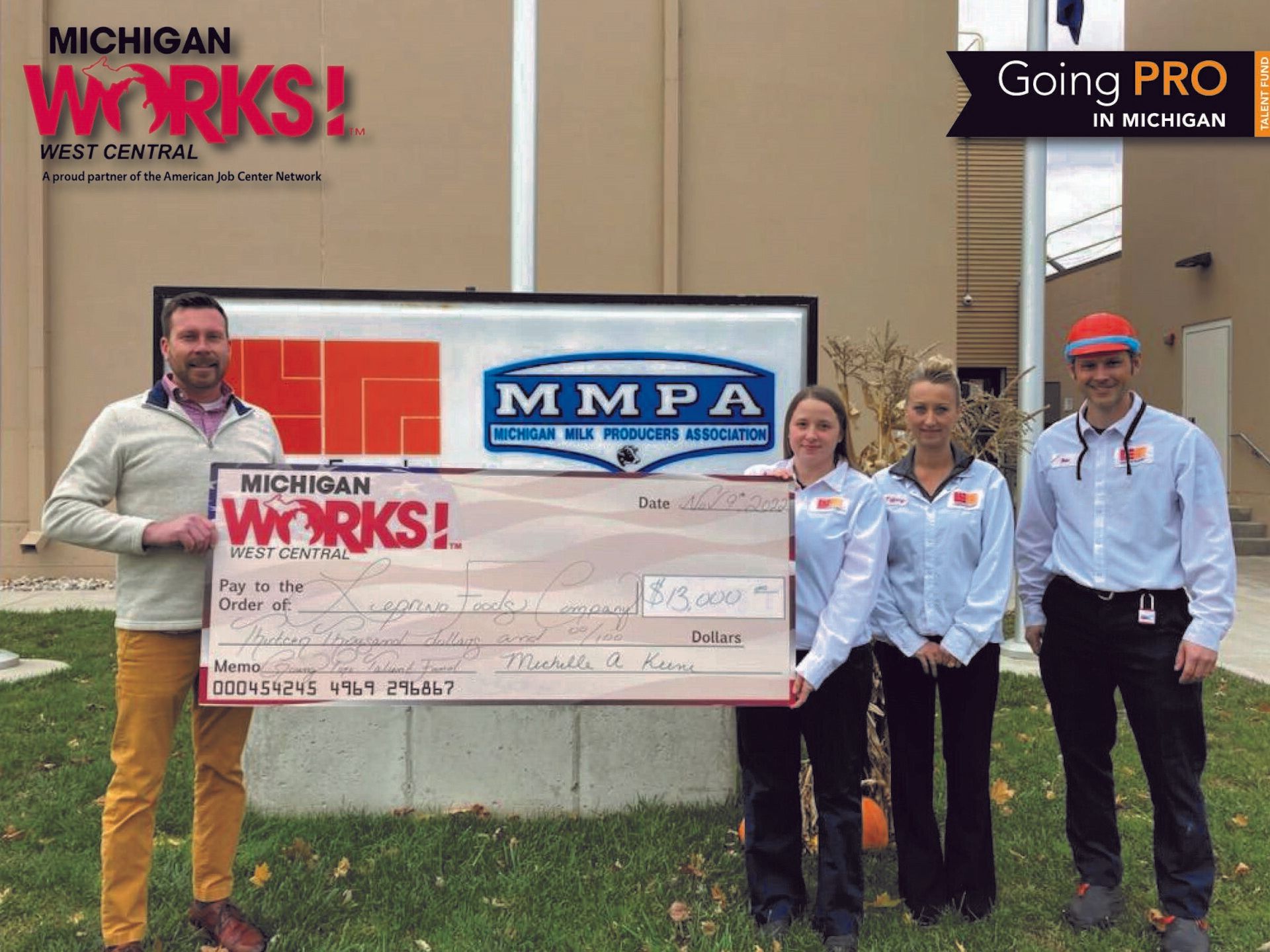 Michigan Works! West Central Business Services Specialist Chad Marr (left) presents Leprino Foods with a reimbursement check for recently completing its Going PRO Talent Fund training plan. Pictured from Leprino are (left to right) HR Manager Kate Puisis, Senior HR Manager Tiffany Nowland and Plant Manager Dan Ramlo.