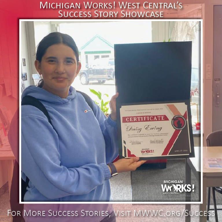Woman in blue hoodie holding a certificate plaque in front of a success story showcase poster