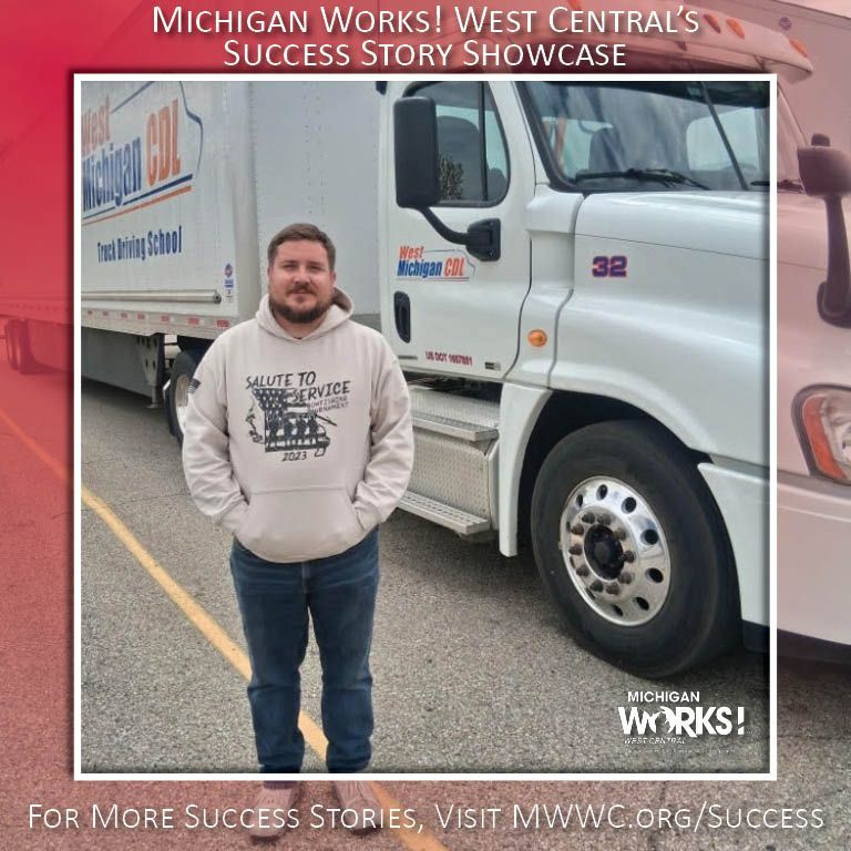 Man in gray hoodie stands beside a white truck with “Michigan Works!” success story showcase text.