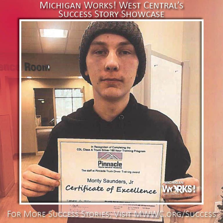 Teen holding a certificate in a hallway, with