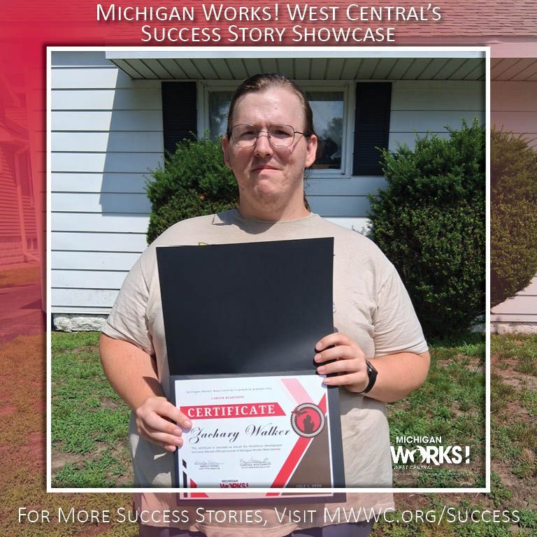 Person holding a certificate and folder outside a house, with
