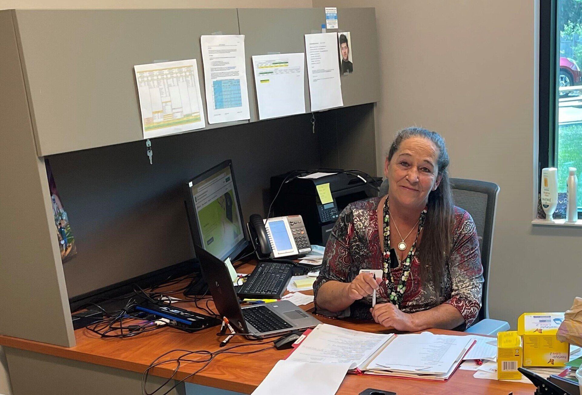 Renee Pickard at her desk.