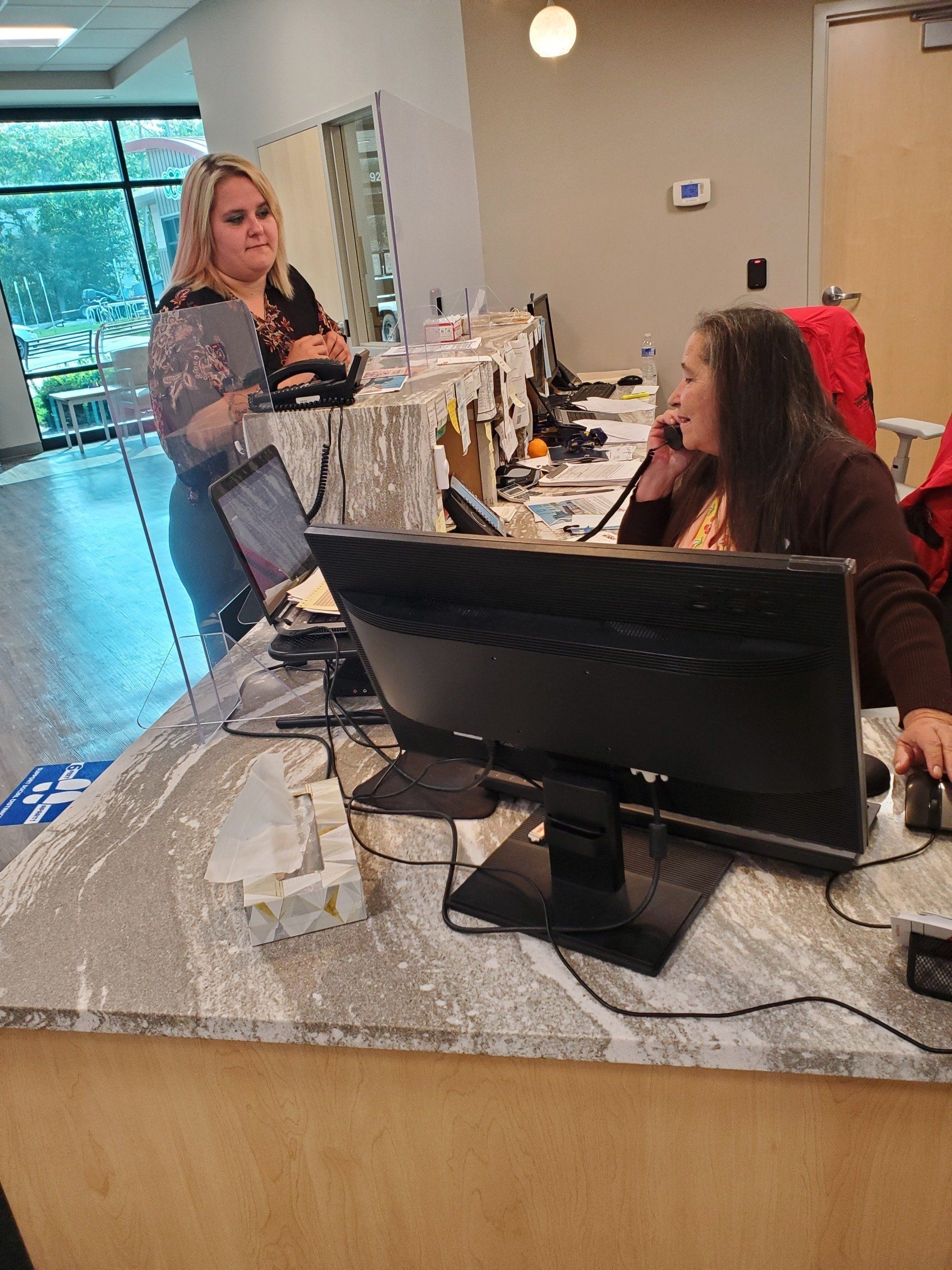 Renee Pickard helps a client at Michigan Works! West Central.