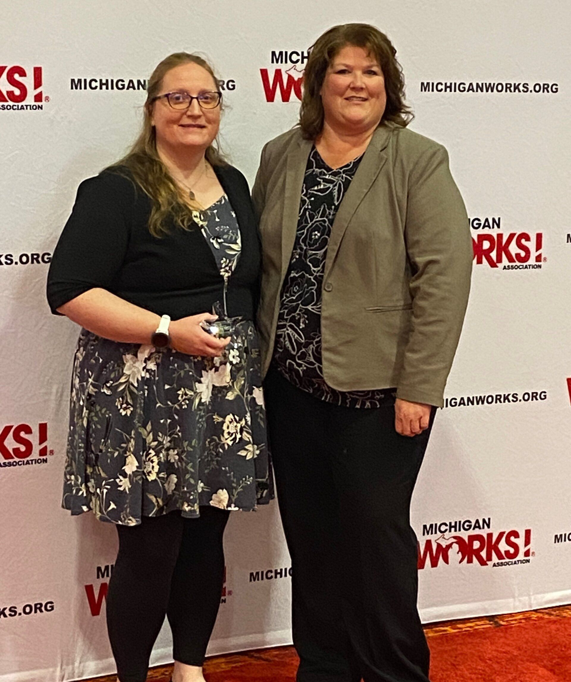 Vanessa Wolgamott (left) accepted her 2022 Shining Star Award during the annual Michigan Works! Association conference in Mount Pleasant. She is pictured with Executive Director Shelly Keene.