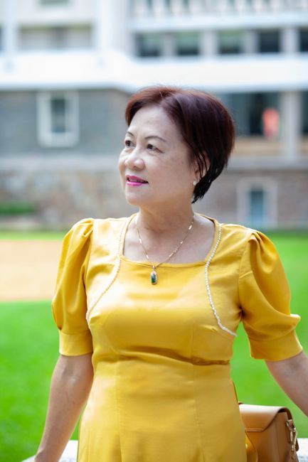 Woman in her fifties outdoors considering hormone replacement therapy, Hommage Women's Clinic, Gangnam, Seoul