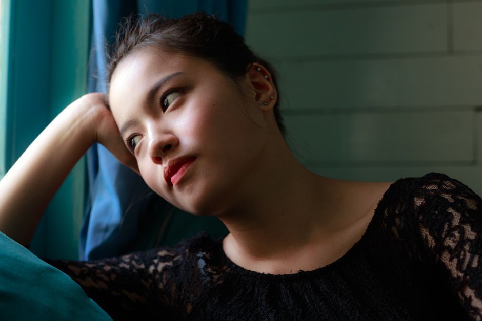 Woman considering realistic expectations of clitoral hood reduction, Hommage Women's Clinic, Gangnam, Seoul