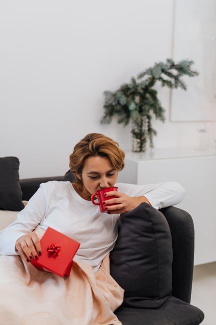 Resting at home with a warm drink after vaginal filler, aftercare guide from Hommage Women's Clinic, Gangnam, Seoul
