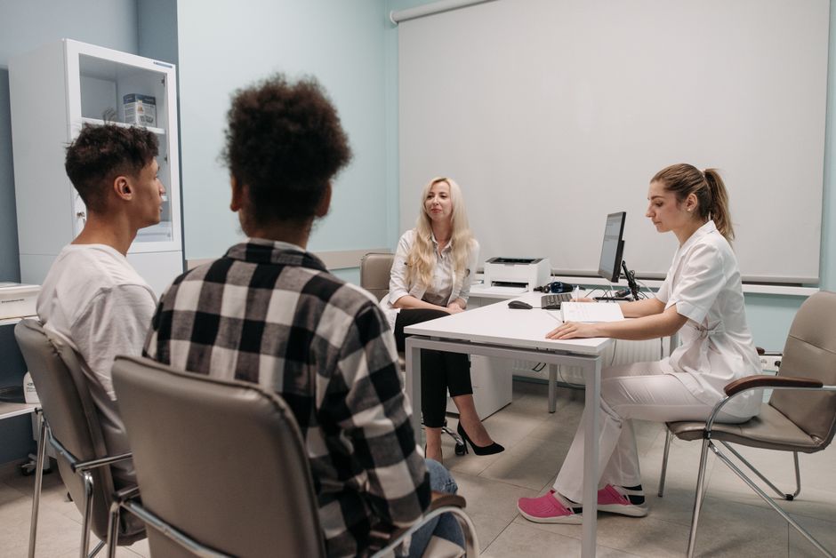Couple discussing ovulation test results with a doctor, Hommage Women's Clinic, Gangnam, Seoul