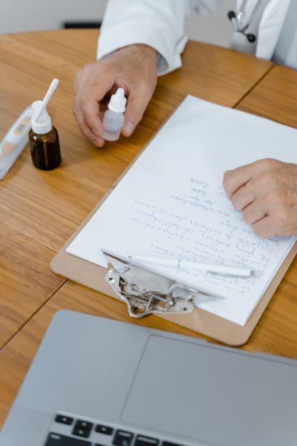 Doctor writing an emergency contraception prescription, required in Korea, Hommage Women's Clinic, Gangnam, Seoul