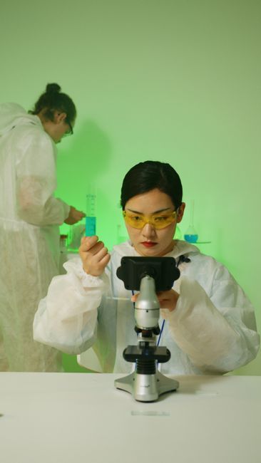 Laboratory microscope analysis identifying Candida yeast for yeast infection treatment at Hommage Women's Clinic, Gangnam, Seoul
