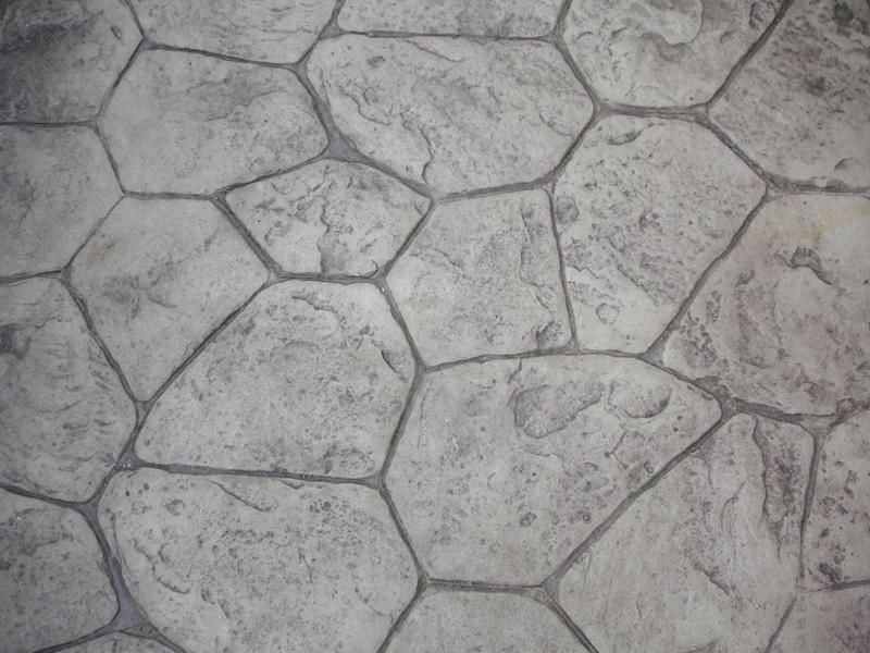 Fieldstone stamped concrete with irregular stone shapes and a natural textured finish.
