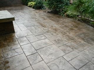Majestic Ashlar stamped concrete patio with natural stone texture and rectangular pattern.