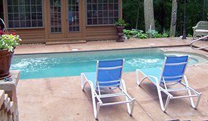 A residential concrete pool deck.