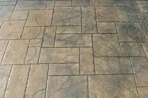 American Ashlar stamped concrete with a natural stone texture and varied rectangular pattern.
