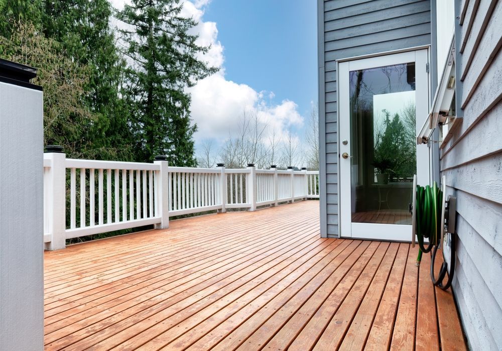 A home with a wooden deck.