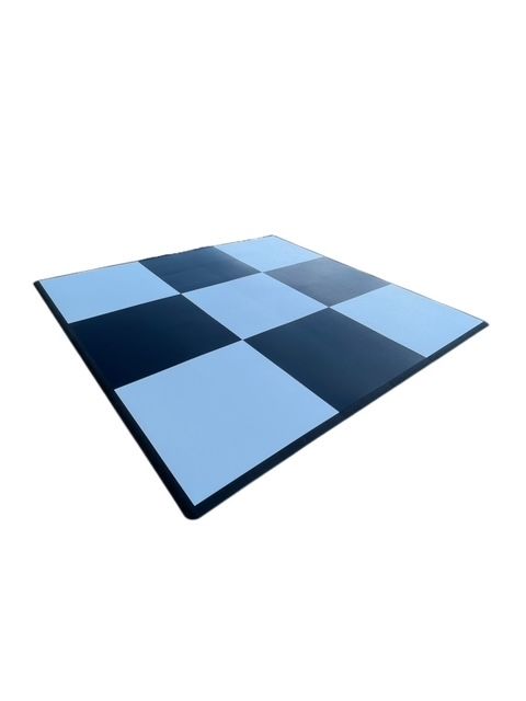 A dance floor featuring a repeating checkerboard pattern of alternating light blue and dark blue squares.