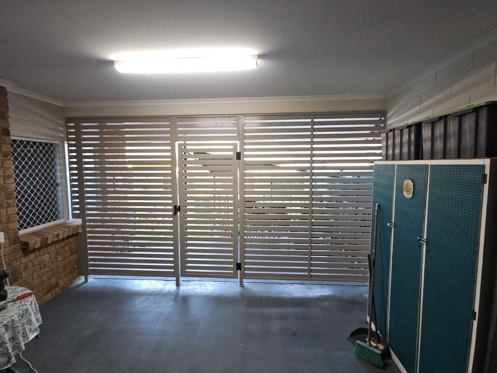 Empty Living Room With Sliding Glass Door — A & B Lattice World & Patios in Bungalow, QLD