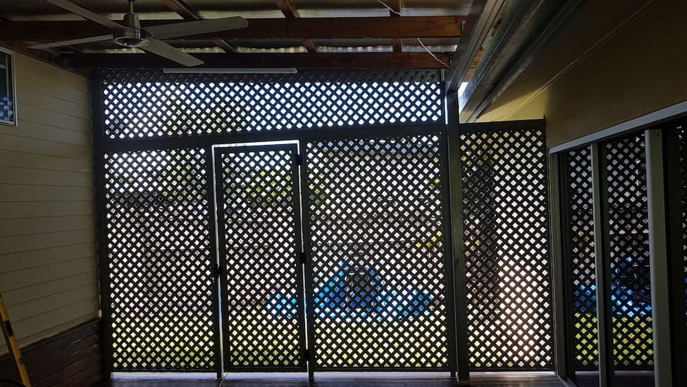 A Room With a Lattice Fence and a Ceiling Fan — A & B Lattice World & Patios In Douglas Shire, QLD