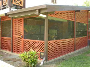 A Screened in Porch with A Lattice Fence and A Door — A & B Lattice World & Patios in Bungalow, QLD
