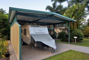 A Caravan Is Parked Under a Carport — A & B Lattice World & Patios in Bungalow, QLD