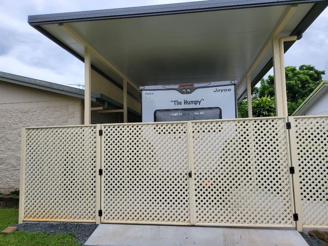 A Rv is Parked Under a Canopy in Front of a House — A & B Lattice World & Patios In Douglas Shire, QLD