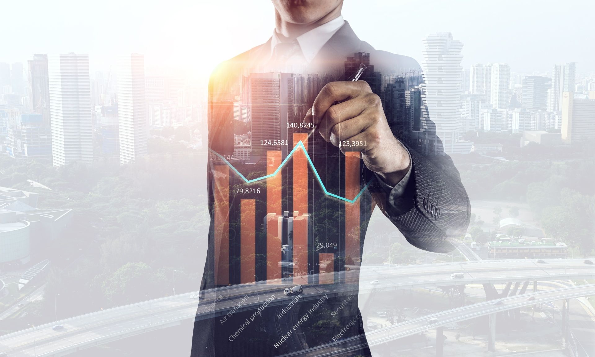 A man in a suit is drawing a graph on a screen.