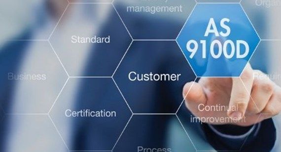 A person is pressing a button that says as 9100d on a screen.