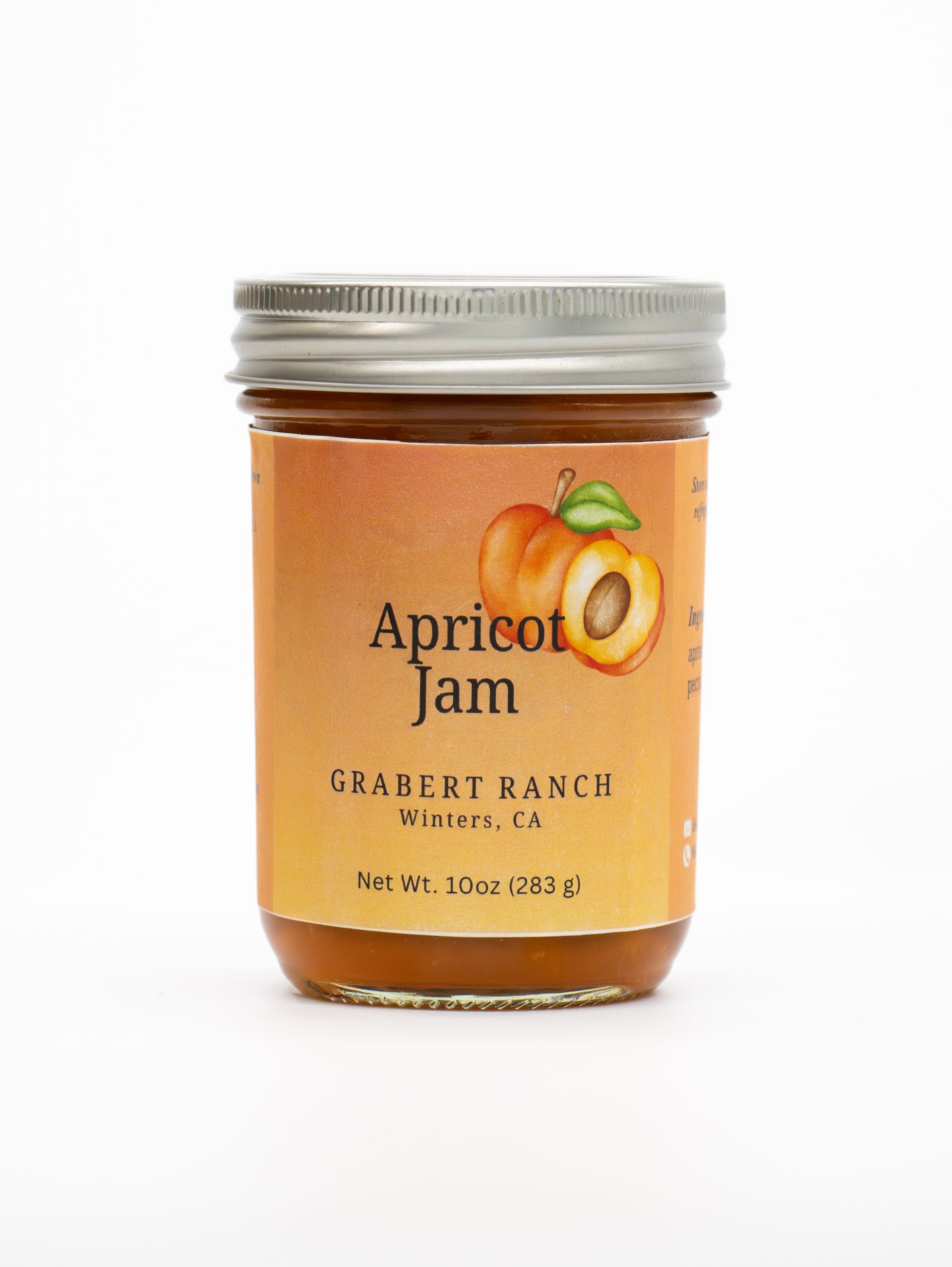 A jar of Grabert Ranch apricot jam with a label featuring an illustration of an apricot, centered on a white background.