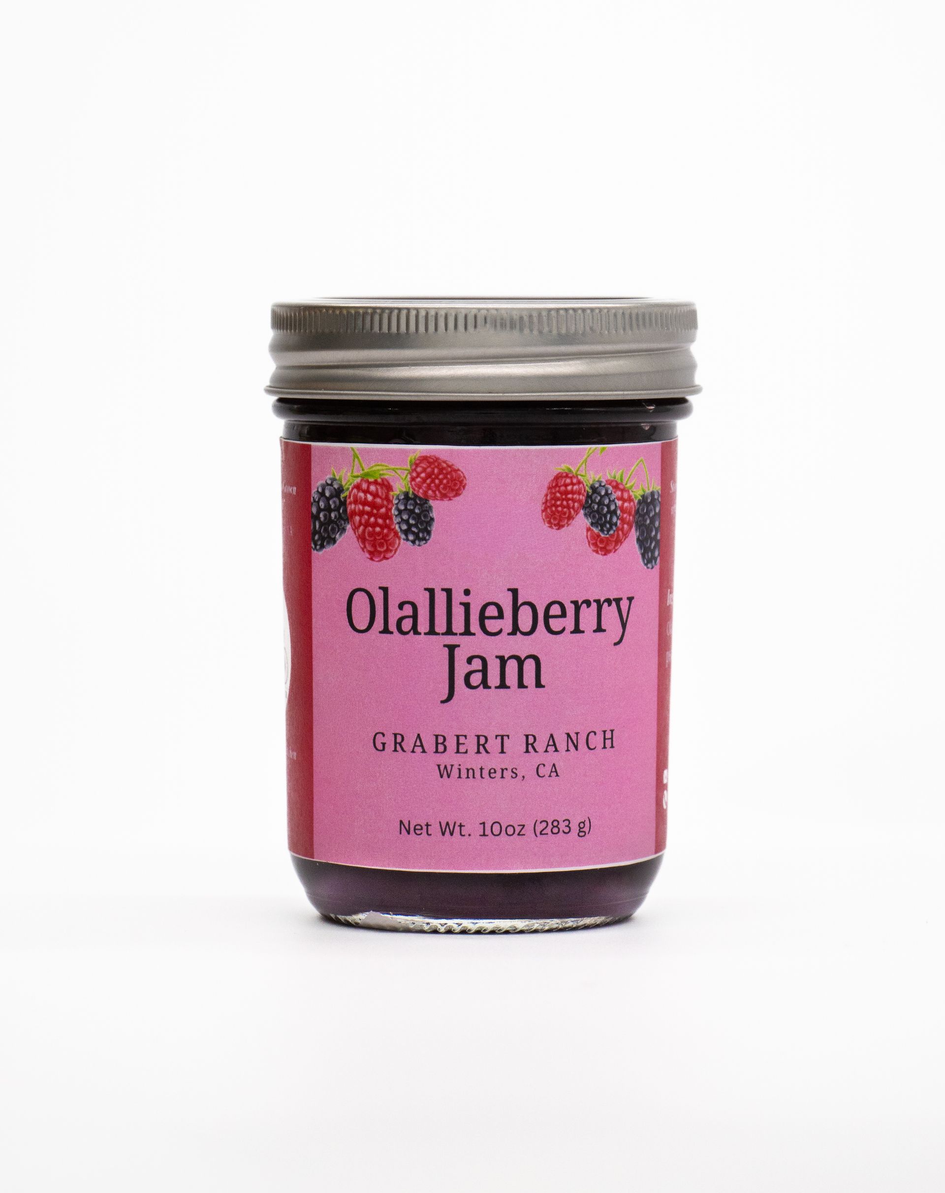 A jar of Olallieberry Jam with a pink label featuring illustrations of berries, isolated against a white background.
